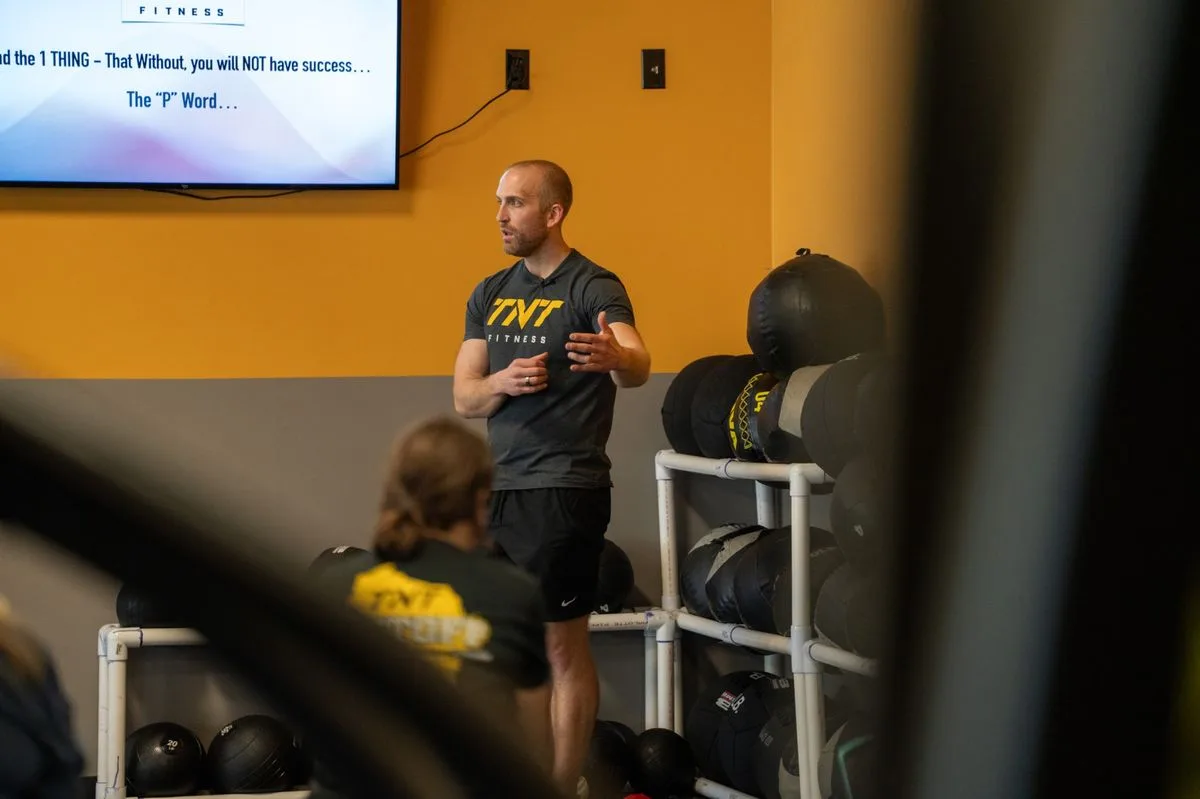 TNT Fitness coach teaching adults during a session in Menasha, Wisconsin
